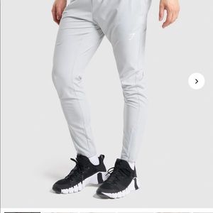 NEW mens Gymshark arrival woven light grey jogger pants